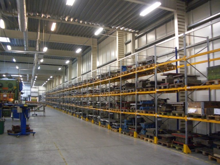 Long warehouse aisle with pallet racks