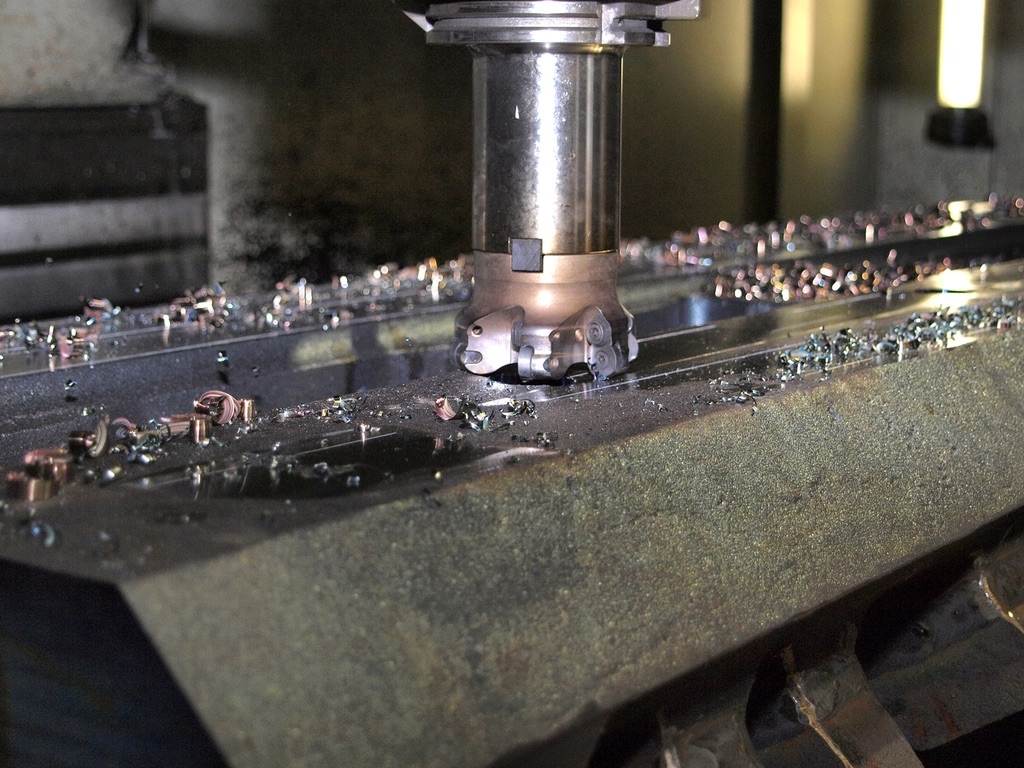 CNC milling machine cutting metal